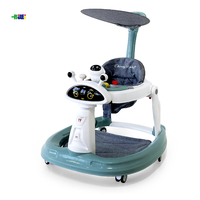 Déambulateur musical multifonctionnel OEM en gros pour bébé, anti-jambes en O, avec roues, pour apprendre à marcher et passer du position assis au position debout, pour enfants