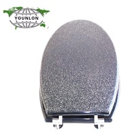 Siège de toilette en bois moulé de forme ronde avec paillettes, de qualité supérieure