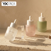 Flacons compte-gouttes en verre transparent de 30 ml avec logo personnalisé de luxe, avec pompe pulvérisatrice colorée pour l'emballage de cosmétiques et de soins de la peau