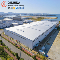Bâtiment d'entrepôt en acier de grande capacité pour la logistique nationale, structure à portique rigide Q355B avec poutre en acier galvanisé approuvée CWB