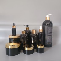 Bouteilles d'emballage et pot de couleur noire en plastique de luxe de 10ml à 1000ml pour la croissance des cheveux