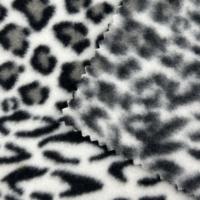 Tissu imprimé léopard écologique très demandé, anti-boulochage, tricoté en chaîne, 100 % polyester, 275 GSM, poids moyen, pour vêtements