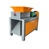 Déchiqueteuse de vêtements textiles usagés, déchiqueteuse de plastique, de ferraille, d'acier, de pneus usagés, de coques de noix de coco, machine à broyer les bouteilles en plastique