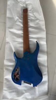 Guitare électrique bleue à 7 cordes avec manche en érable carbone, design sans tête, dos/côtés en acajou, matériau latéral en acajou