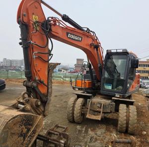 รถขุดล้อยี่ห้อ Doosan รุ่น DX140W มือสอง น้ำหนัก 14 ตัน รถขุดล้อแท้จาก Doosan ชั่วโมงการทำงานต่ำ ขาย - Product Image 2