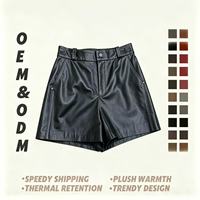 Shorts en cuir noir décontractés pour femme, respirants et imperméables, taille mi-haute élastique, avec boutons-pression latéraux – Collection Chic de notre Outlet d'usine
