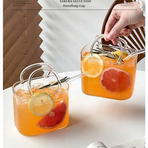 Verre à cocktail transparent créatif et amusant, design <span class=keywords><strong>sac</strong></span> à <span class=keywords><strong>main</strong></span>, très tendance, pour thé aux fruits d'été, avec un design ludique et un aspect élégant - Product Image 2