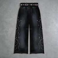 Pantalon de survêtement vintage délavé et déchiré pour homme, coupe large, taille élastique, avec bords bruts et patchwork, style streetwear