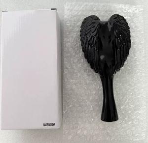 Peigne et brosse créatifs en plastique en forme d'ailes d'ange, avec poignée portable et poils doux, vente en gros - Product Image 6
