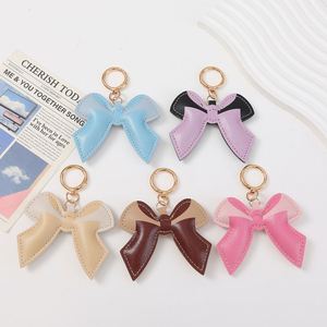 YY PU Leather Bow Keychain Small Backpack Key Ring Pendant Cute Bow Purse <b>Charms</b> with Lobster Clasp for Giifts - Product Image 1