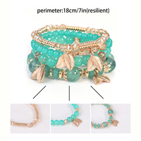 Bracelets de perles extensibles en verre style bohème à prix de gros pour femmes, avec pendentifs trèfle à quatre feuilles
