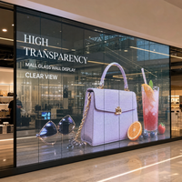 Écran LED transparent personnalisé en verre pour mur de verre de centre commercial