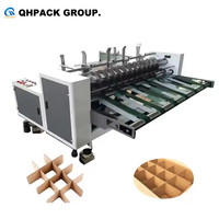 Machine à découper les cloisons en carton ondulé à grande vitesse automatique QHPACK