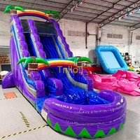 Toboggan aquatique gonflable double voie de qualité commerciale de 27 pieds avec palmier tropical en PVC pour parc de trampoline