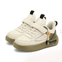 Chaussures de sport décontractées pour enfants, garçons et filles, en gros, mode printemps-hiver, imperméables, tricotées, avec semelle intermédiaire en TPU et semelle extérieure en EVA/PVC