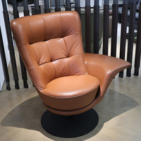 Canapé tournant italien moderne et léger de luxe avec rotation à 360 degrés en cuir véritable pour espaces lounge