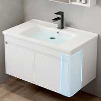 Meuble-lavabo mural flottant moderne en aluminium spatial avec vasque en céramique intégrée pour projets hôteliers