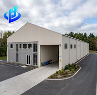 Entrepôt préfabriqué en structure acier Q355B ASTM A572 galvanisé à chaud pour stockage logistique industriel