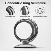 Grande sculpture circulaire en acier inoxydable poli miroir, art métallique moderne en boucles concentriques, pour cour de villa, fabrication sur mesure