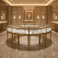 Vitrine de présentation de bijoux ronde multi-faces sur mesure avec cadre métallique, éclairage LED, vente en gros directe usine