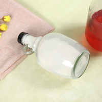 Bouteilles de vin et growlers à bière en verre ambré MAYSURE de 64 oz / 2 litres avec bouchon couronne et estampage à chaud, style bouteille de vin californienne