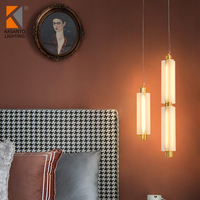 Lustre moderne de petite taille Rakumba Metropol Sebastian Herkner, suspension en verre et fer avec pendentifs en verre