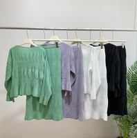 Ensemble décontracté deux pièces plissé minimaliste OEM d'usine, style Dubaï, couleur lavande unie, avec cardigan à franges et jupe midi