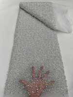 Tissu en stock pour robes de soirée à motif floral, dentelle à sequins, tulle et maille rayée