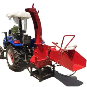 The tractor drives the garden city road branch twig shredder sawdust sawdust wood shredder 15hp wood chipper