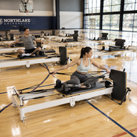 Reformer de Pilates pliable en aluminium durable et portable avec plateforme antidérapante pour studio de Pilates et spa d'hôtel