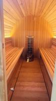 Sauna extérieur en bois massif 2026 avec panneau de commande informatisé, poêle électrique 4,5 kW et vapeur