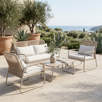 Ensemble de salon de jardin en rotin 4 pièces avec structure en acier thermolaqué et assise en osier tressé pour l'extérieur