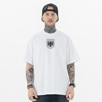 Kaos Katun Hitam Longgar Lengan Pendek dengan Cetakan Grafis Kerah Bulat Gaya Streetwear