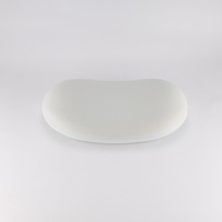 Oreiller de nuque ergonomique en mousse à mémoire de forme en soie glacée, forme extraterrestre, pour le soin du cou, avec noyau en mousse à mémoire de forme, pour la sieste, vente en gros