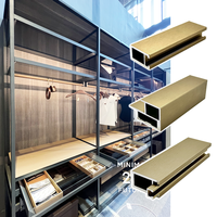Hôtel 5 étoiles porte pliante aluminium armoire en bois Design Simple vêtements cadre en acier armoire en bois avec portes coulissantes en miroir