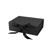 Boîte cadeau pliable en papier rigide noir avec finition mate personnalisée et fermeture magnétique