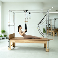 Table de Pilates Cadillac en bois de caoutchouc commercial avec coussin en PU pour la rééducation en studio