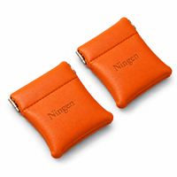Étui mini-porte-monnaie en cuir PU orange avec fermoir à pression, petit étui pour écouteurs, logo personnalisé en relief, pour femmes, rangement de pièces de monnaie, vente en gros