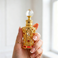 Flacon de parfum arabe de luxe 10 ml, vintage, en métal ajouré, avec bouchon en cristal incrusté de strass, rechargeable, vide, pour Oud