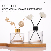 Vente en gros de bouteille diffuseur ronde de luxe personnalisée de 100ml 200ml bouteille vide en verre diffuseur d'anche avec couvercles