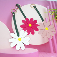 Porte-clés pendentif tendance en cuir PU à motifs floraux superposés (fleur de marguerite, tournesol) pour sac à main, sac fourre-tout et clés de voiture pour femme