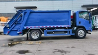 Camion à ordures compacteuses Isuzu 6,5 mètres cubes, camion de nettoyage urbain d'occasion, transport de déchets, usine, 4x4, diesel, boîte de vitesses, pompe
