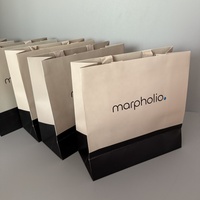 Sacs en papier texturé de luxe avec logo personnalisé et poignée en ruban pour le shopping, l'emballage et les expositions