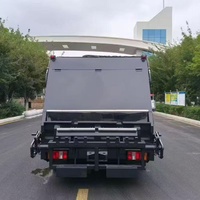 Camion compacteur de déchets Sinotruk HOWO 4x2 6CBM 8CBM à chargement arrière scellé, camion collecteur de déchets hydraulique