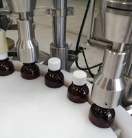 Ligne de production de remplissage, de bouchage et d'étiquetage de bouteilles en PET, machine de remplissage de liquides de 100 ml, ligne de production de remplissage de sirop contre la toux