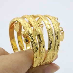 Braccialetto Trendy per Bambini in Rame Placcato Oro, Ipoallergenico, <span class=keywords><strong>con</strong></span> Stella Intagliata e Campanellini a Cuore - Product Image 6