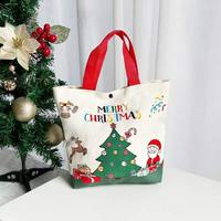Articles cadeaux de Noël en toile réutilisables en gros avec personnalisation de logo par lots. Sac fourre-tout tendance pour les fêtes