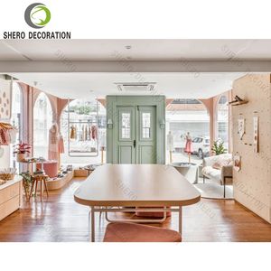 Diseño Interior Moderno para Tienda de Ropa, Exhibidores Personalizados para Tienda de Ropa Infantil con Vitrina de Madera para Ropa de Niños - Product Image 4