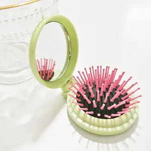 Factory Price Round Foldable Mirror with Airbag Hair Brush Mini Compact Portable Makeup Mirror with Massage Comb