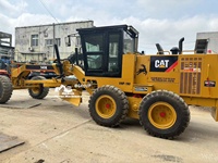 Niveleuse à moteur Cat 140K d'occasion avec lame de 12 pieds et transmission à 8 vitesses Power Shift